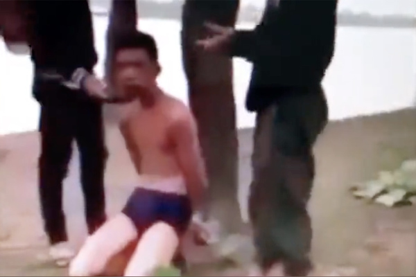 Điều tra clip thanh niên bị đánh đập, bịt mặt chôn sống