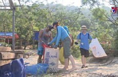 Expats join local people to clean up coastal city