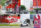 Hình ảnh đường phố rợp sắc cờ đỏ trước đại lễ 30/4