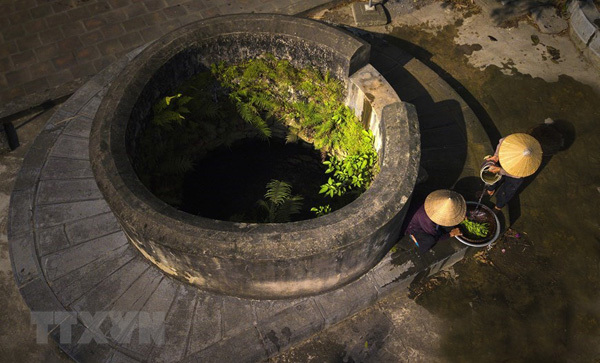 Ancient village well in Hoa Lu former imperial city