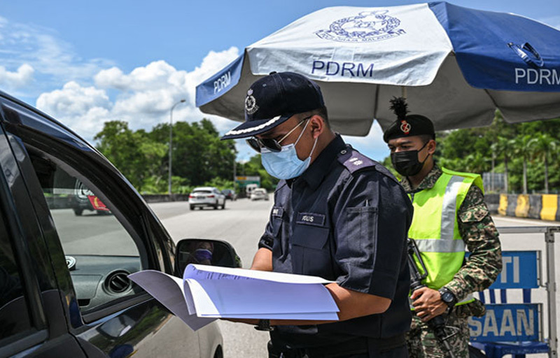 Malaysia báo động đỏ Covid-19, Lào gia hạn phong tỏa toàn quốc