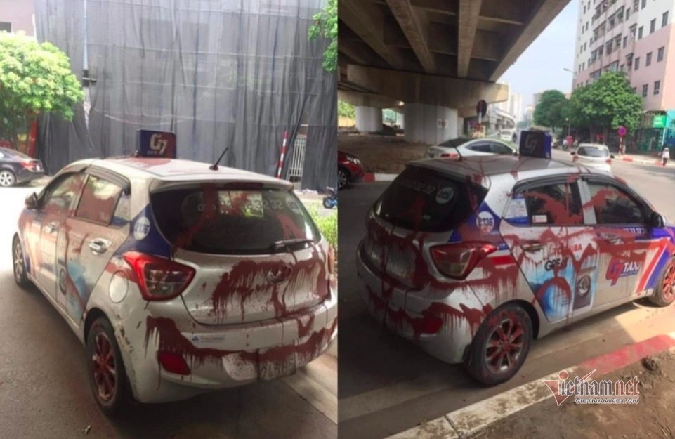 Xe taxi bị tạt kín sơn ở Linh Đàm, tài xế phẫn nộ