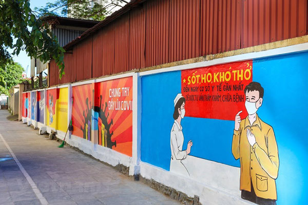 Murals in Hanoi convey message of fighting Covid-19