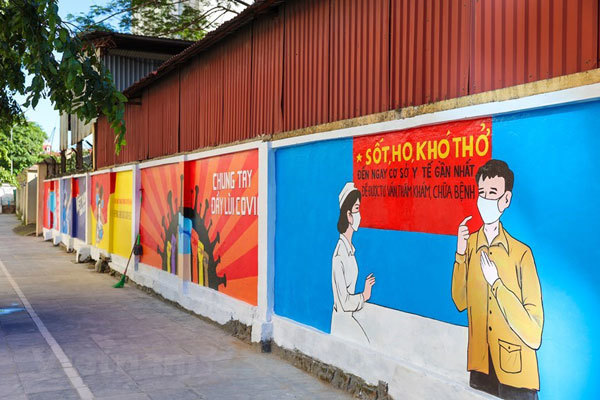 Murals in Hanoi convey message of fighting Covid-19
