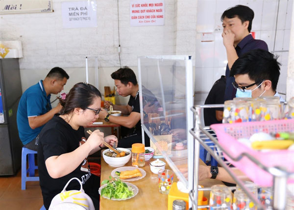 Hanoi shuts in-person dining, barbershops starting July 13