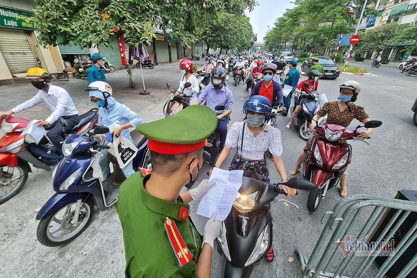 Hanoi changes document requirements for people who need to go out