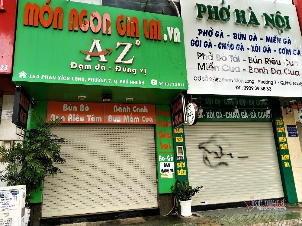 Được phép mở, hàng quán ở TP.HCM, Đà Nẵng vẫn 'cửa đóng then cài' -  VietNamNet