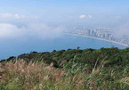 Enjoying early morning dew on the peak of Son Tra Peninsula