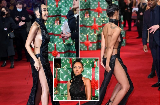 Nữ ca sĩ phải che chắn khổ sở trên thảm đỏ vì váy hở tứ bề