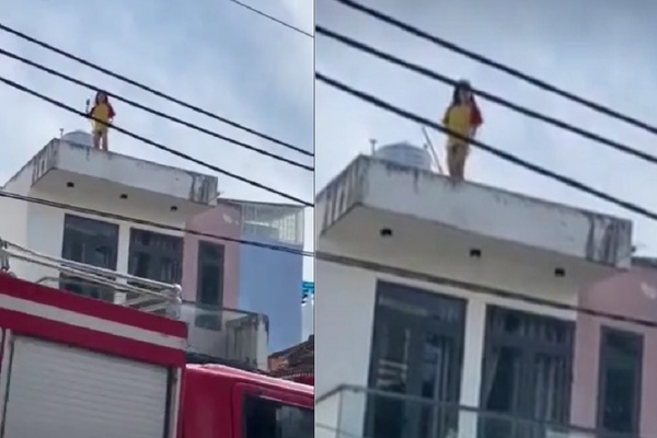 Cảnh sát giải cứu cô gái múa 'thoát y' trên nóc nhà ở TP.HCM