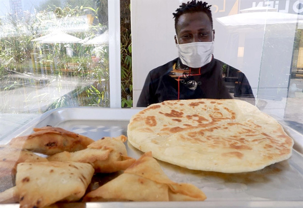 Ugandan dancer brings African cuisine to Vietnam