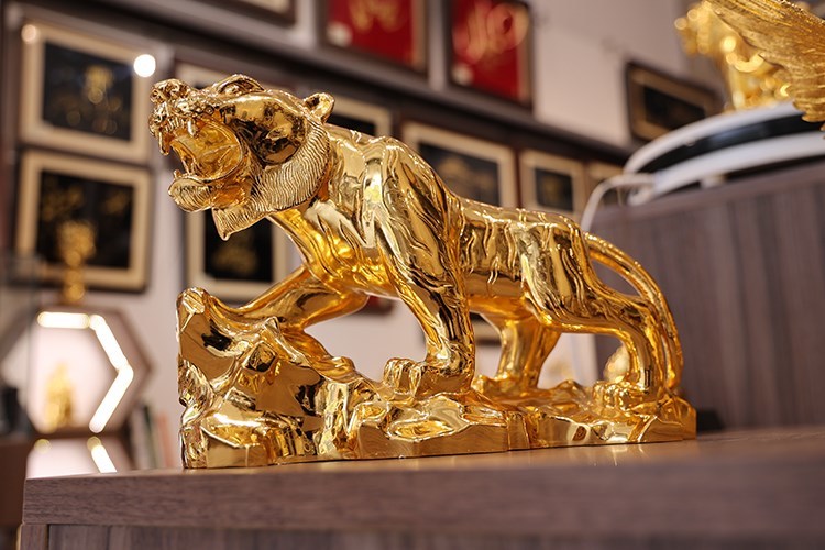 Gold plated tigers hit souvenir shops in Hanoi