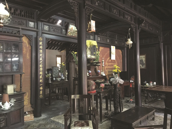 Preserving Hue's symbolic wooden houses