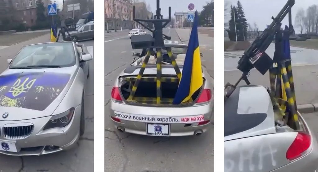 Ukrainians customizing a convertible BMW with a machine gun for the police