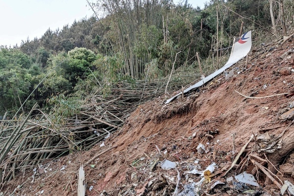 Body of plane crash victim found in China