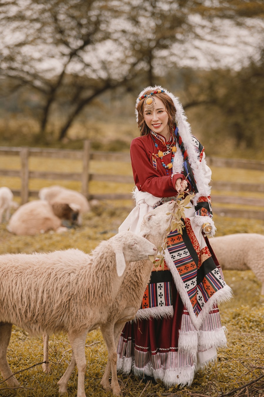 Quynh Nga is attractive and hard to take her eyes off when hugging sheep and arching