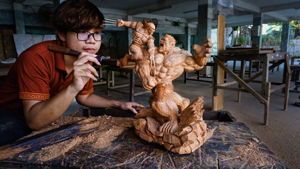 Young woodcarver puts modern twist on traditional craft